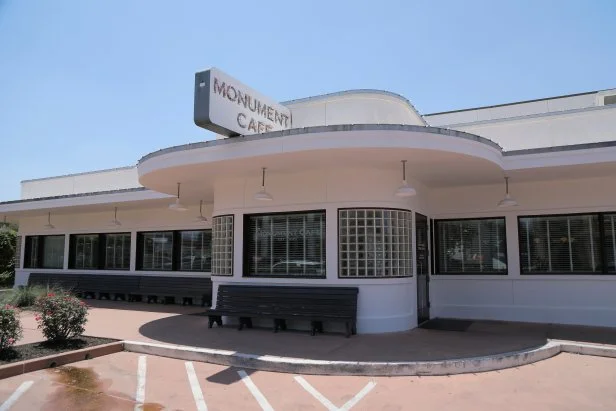 Exterior of Monument Cafe in Austin, Texas, as seen on Food Network's Triple D Nation, season 8.