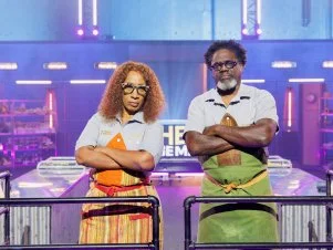 Contestants Tia Raiford and Matthew Raiford hero pose side by side, as seen on Chef Grudge Match, Season 1.