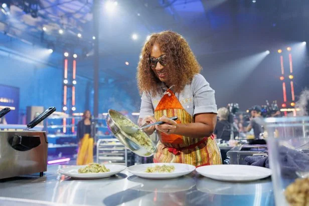 Contestant Tia Raiford cooking process, as seen on Chef Grudge Match, Season 1.