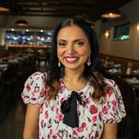 Maneet Chauhan smiling at camera