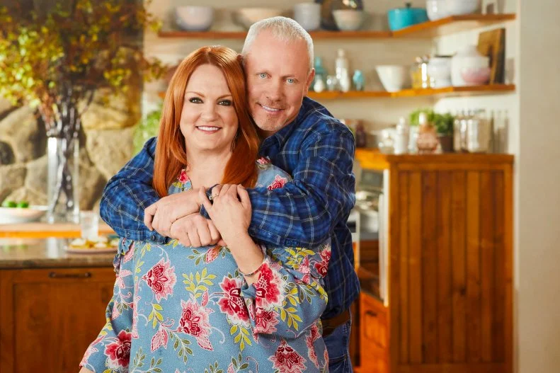 Ladd hugs Ree Drummond in the kitchen