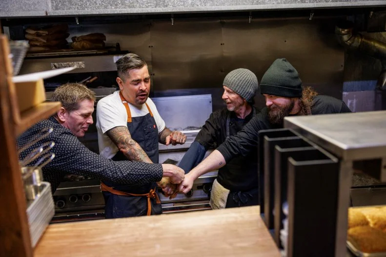 Aaron Sanchez Fist pump together with Jae N, Cody C and Fred T in the kitchen
