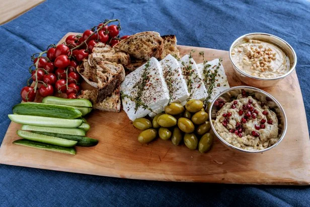 Close-up of Easy Mezze Board and Marinated Herbed Feta, as seen on Be My Guest with Ina Garten, Season 8