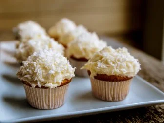 Close Up of Coconut Cupcakes, as seen on Be My Guest with Ina Garten, Season 9
