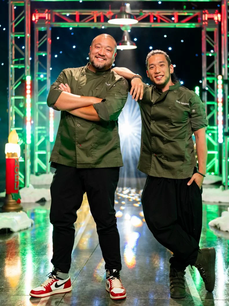 Contestants Kevin Lee and Shota Nakajima pose, as seen on Tournament of Champions: All-Star Christmas, Season 2.