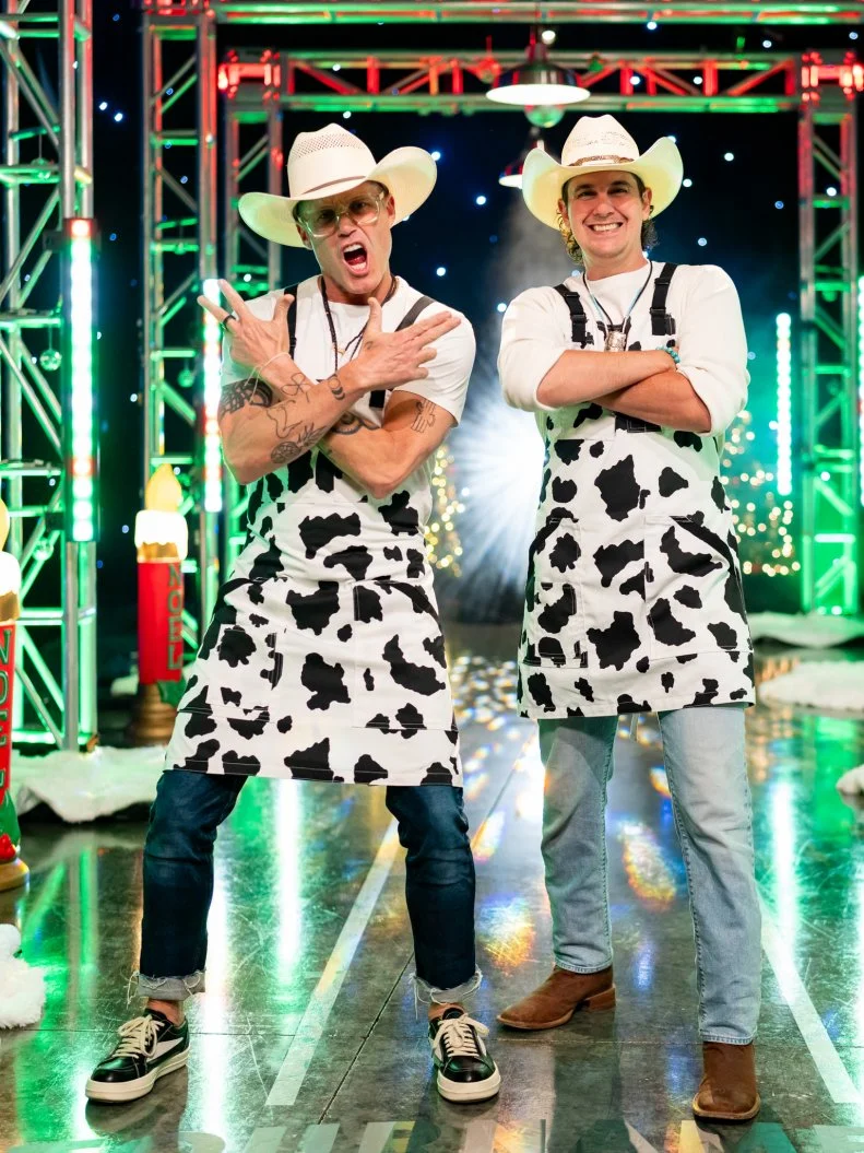 Contestants Brian Malarkey and Carlos Anthony pose, as seen on Tournament of Champions: All-Star Christmas, Season 2.
