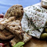 Close-up of Easy Mezze Board and Marinated Herbed Feta, as seen on Be My Guest with Ina Garten, Season 8