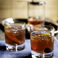 Close-up of Michael Barbaro's Old Fashioned, as seen on Be My Guest with Ina Garten, Season 8. Michael puts plenty of ice in his drinks so they'll stay cold. "Nothing worse than a warm drink.'