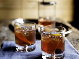 Close-up of Michael Barbaro's Old Fashioned, as seen on Be My Guest with Ina Garten, Season 8. Michael puts plenty of ice in his drinks so they'll stay cold. "Nothing worse than a warm drink.'