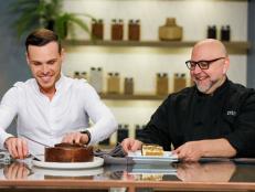 Guest Judge Amoury Guichon and Judge Duff Goldman taste, as seen on The Ultimate Baking Championship, Season 1.