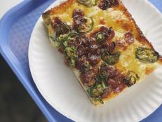 This is our square pie at Pizza Supreme Being. The dough is intentionally wet, giving it a light, airy crumb and crispy caramelized cheese edges. Sweet lap cheong sausage, rich garlic cream and warm spiced honey balance each other. Let the cheese hit the sides of the pan. That edge is everything.