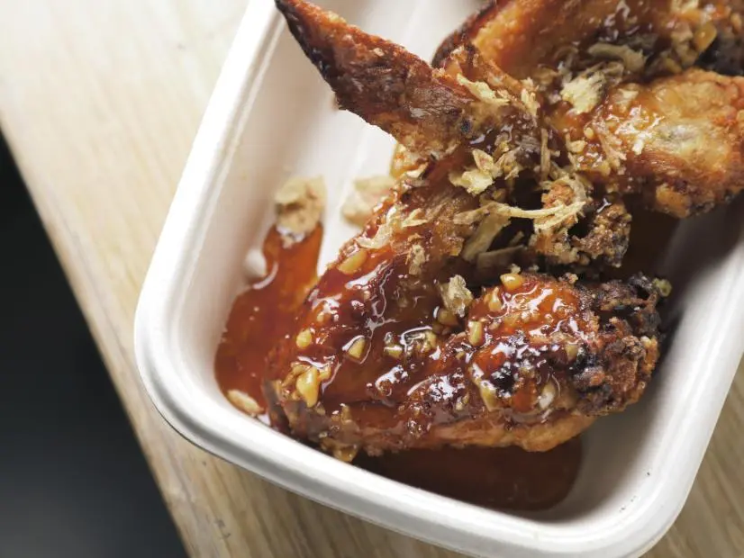 Nuoc Mam Wings as prepared by Chef/Owner Viet Ngo at Vietnoms in San Jose, California as seen on Food Network's Diners Drive-Ins and Dives, season 43.