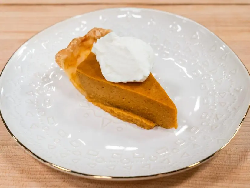 Host Giada DeLaurentiis' Persimmon-Pumkin Pie, as seen on Ultimate Thanksgiving Challenge, Season 2.