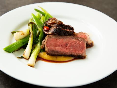 Reverse-Seared Ribeye with Miso Sauce and Charred Scallions