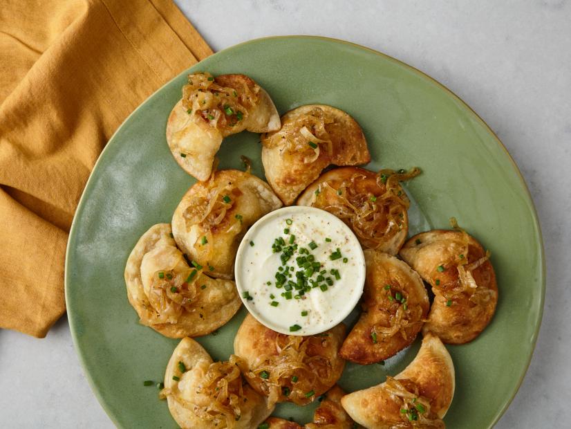 Chris Santos's Food Network Kitchen's Potato and Cheese Pierogi with Caramelized Onions as seen on Food Network