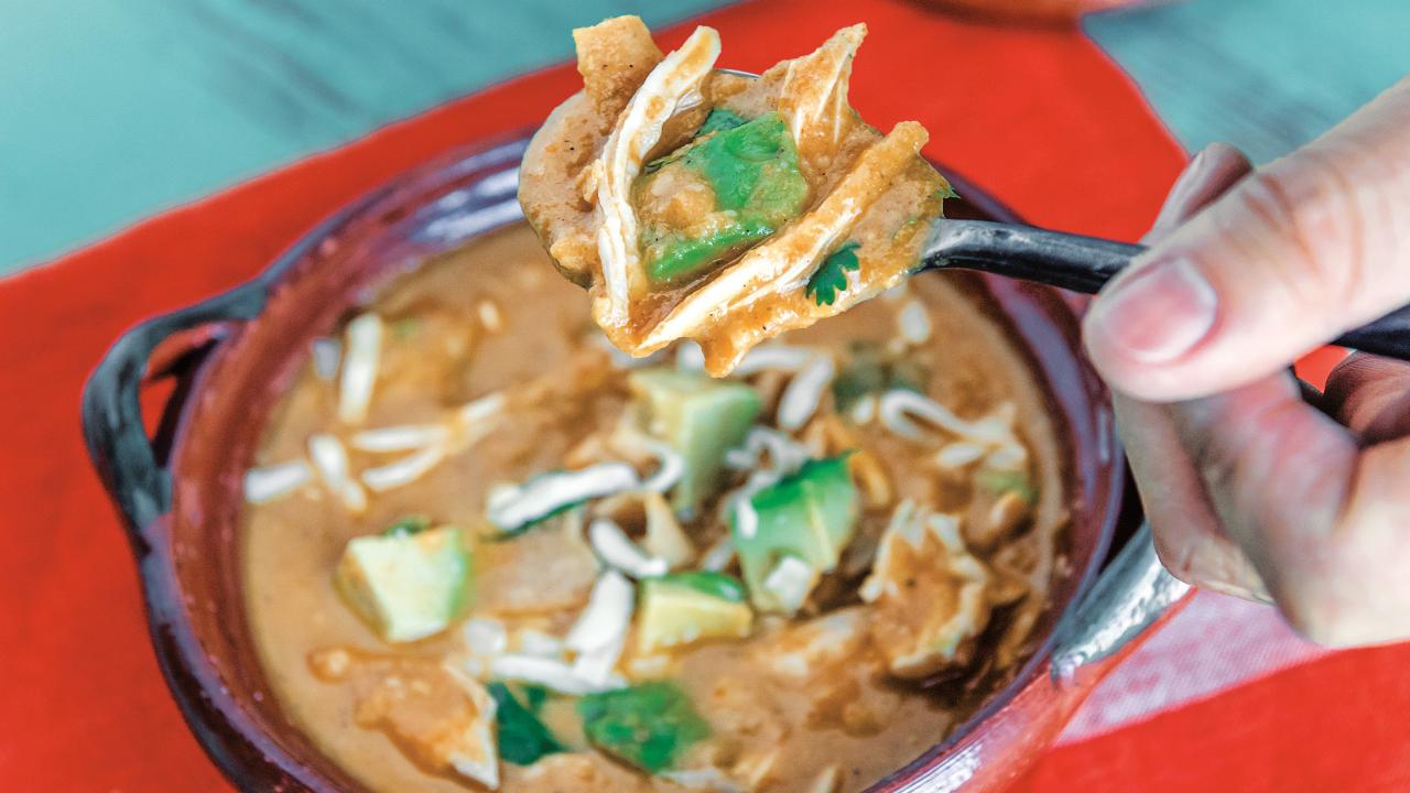 https://food.fnr.sndimg.com/content/dam/images/food/plus/fullset/2019/11/15/0/FNK_tila-cheesy-chicken-tortilla-soup_s4x3.jpg.rend.hgtvcom.1280.720.suffix/1573847083791.jpeg