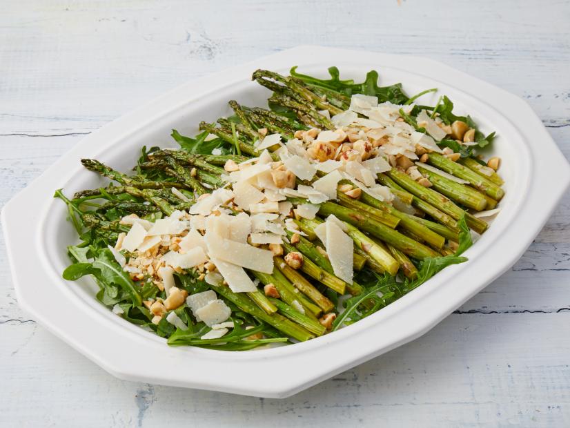 Anne Burrell Roasted Asparagus with Lemon Parmigiano & Hazelnuts, as seen on Food Network Kitchen.