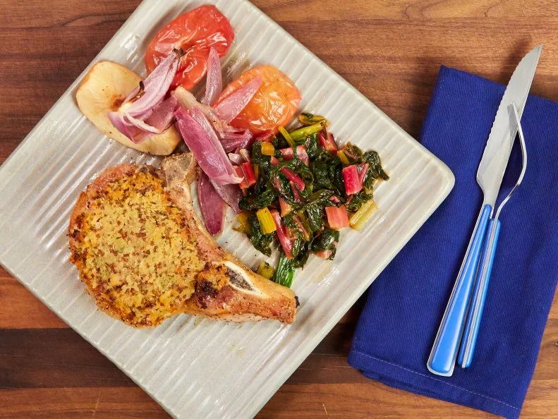 Mustard crusted pork chop with roasted apples and shallots as seen on Food Network Kitchen Live.