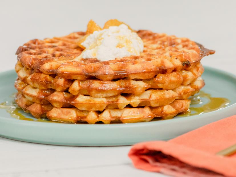 Bobby Flay features Toasted Polenta Waffles with Whipped Ricotta and Winter Citrus Syrup, as seen on Food Network Kitchen Live.