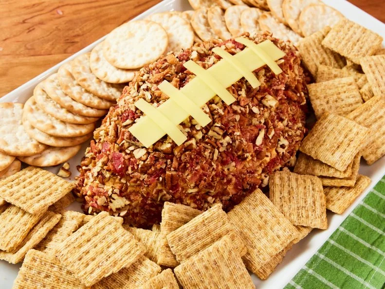 Smoky Football Cheese Ball with Pecan-Bacon Crust, as seen on Food Network Kitchen Live.