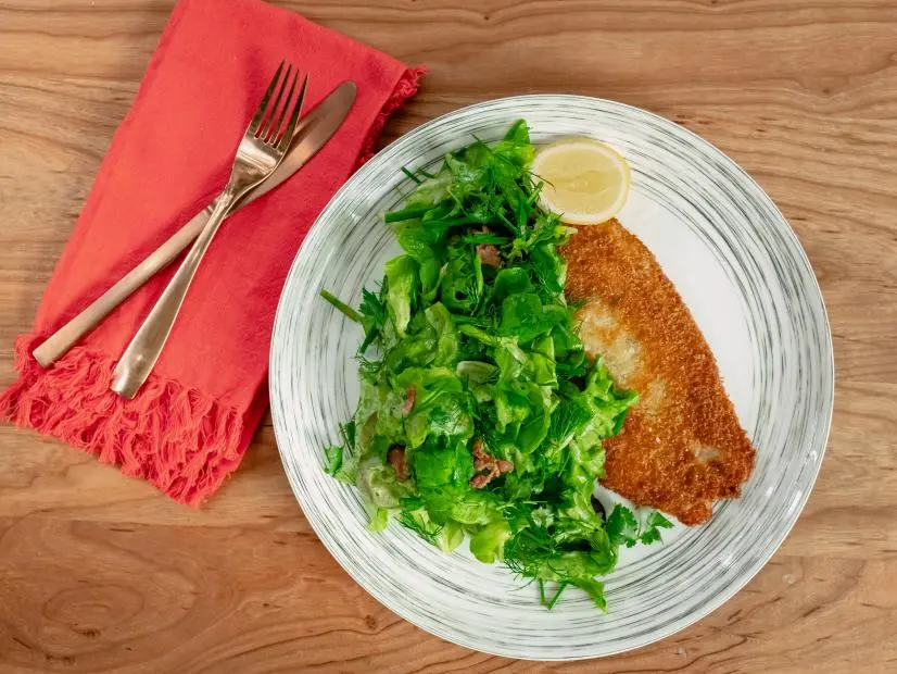Justin Chapple features Flounder Milanese with Herbed Salad and Bacon Vinaigrette, as seen on Food Network Kitchen Live.