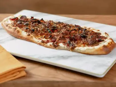 Alejandra Ramos features Tarte Flambee with Goat Cheese, as seen on Food Network Kitchen Live.