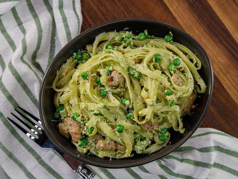 Tagliatelle with Peas, Sausage, Ricotta and a Classic Genovese Pesto beauty, as seen on Food Network Kitchen Live.
