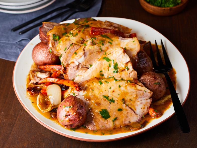 Michael Symon's Roasted Pork Shoulder with Gravy as seen on Food Network Kitchen.