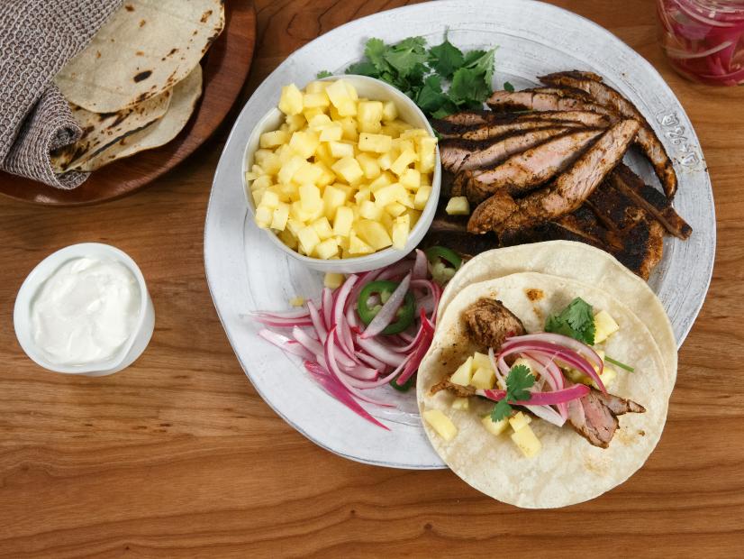 Pork Tenderloin Tacos with Pineapple and Quick-Pickled Red Onions, as seen on Food Network Kitchen Live.