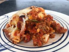 This recipe makes two pans of lasagna rolls. You can bake both or freeze one for later.