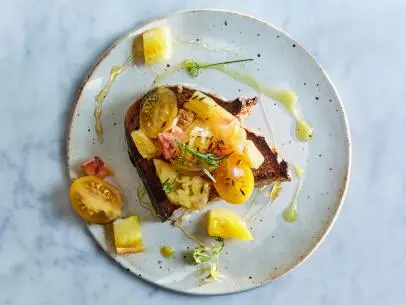Host Sarah Copeland's completed Moroccan Tomato Toast, as photographed in her cookbook, Every Day is Saturday. Photo used with permission from Gentl + Hyers.