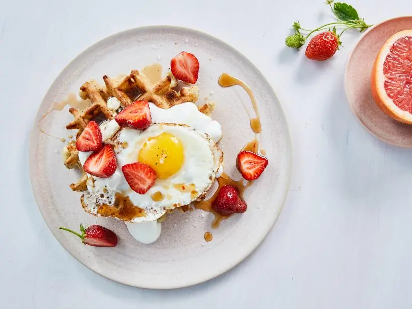 The completed Family Waffle, topped with an egg, photographed for Sarah Copeland's cookbook, Every Day is Saturday. Photo used with permission from Gentl + Hyers.