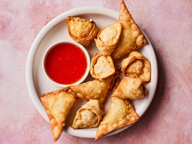 Description: Jet Tila's Crab Rangoon. Keywords: Crabmeat, Cream Cheese, Scallions, Tarragon, Wonton, Egg, Sweet Chili.