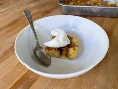 Okay, I know this never happens but, just for fun, let's say you have cake doughnuts sitting around that have gone stale. Impossible, I know, but let's just imagine it happened. You don't want to throw them away; that would be a waste. So, you really only have one option: Make bread pudding. It's really best when you serve it with cold ice cream on top. And caramel sauce. Oh, and chocolate chips. It's called "bread pudding" because originally it was made with stale bread, which might sound gross, but if you have old (but not too old!) bread sitting around, try this recipe with it. You'll freak out it's so good.