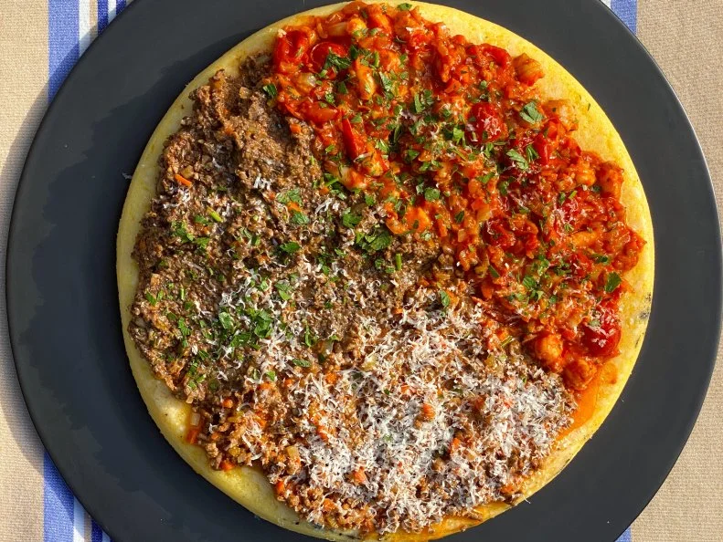 Traditional Beef Bolognese, Mushroom Bolognese, and Shrimp Bolognese, all on top of Parmesan Crusted Polenta, as seen on Symon's Dinners Cooking In, Season 1.