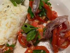 I realize that most people who avoid egg yolks, eating only the whites, are looking to conserve calories and eat healthfully. I make egg white omelets for a different reason: egg whites are a blank canvas and leave room for the flavors and textures of herbs and cheese to truly shine. Be sure to use the freshest eggs you can find, because fresh egg whites are denser and cook up heartier than thin older whites. In this omelet, the egg white takes the tarragon and Parmesan and runs with them. By the way, this omelet can easily be made without the cheese and with the addition of roasted mushrooms or cherry tomatoes. I like the "lean" egg white mingling with the rich cheese.