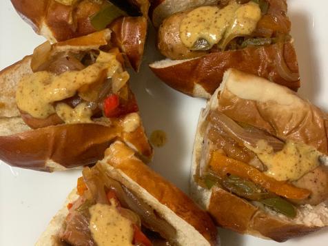 Skillet Brats with Beer Caramelized Peppers and Onions