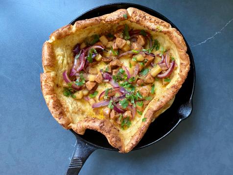 Savory Dutch Baby with Bratwurst and Onions