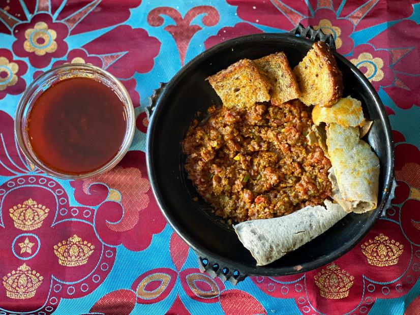 Marcus Samuelsson makes Beef Kitfo with his wife, as seen on his Ethiopian Inspired Dishes course, on Food Network Kitchen.