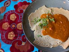 I seek out vegetarian dishes and this is one I love. You could consider shiro the mashed potatoes of Ethiopia; chickpea flour is something everyone can afford and it's nourishing. But nourishing doesn't come close to describing the flavors you get from the caramelized onion puree, the tomatoes, the berbere. It's rich and earthy and satisfying. Serve it as a side dish or add some shiro to Berbere Roasted Carrots & Fennel with Oranges or just to some cooked broccoli and you have a perfect light and healthy lunch. As for the spiced butter, make it and you have flavor. You can saute with it because it's been clarified and can take high heat. You can stir it into rice and use it to finish other dishes. Think of it as the butter.