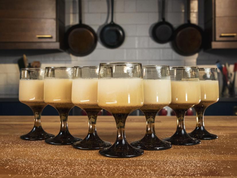 Goblets of Cooked Nog artfully arranged on the kitchen counter, as seen on Food Network Kitchen's Alton Brown Holiday Classes, Season 2.