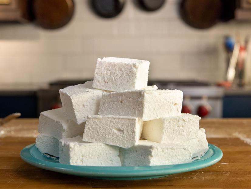 Homemade Marshmallows 2.0 piled high on a plate, as seen on Food Network Kitchen's Alton Brown Holiday Classes, Season 2.