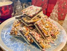 'Tis the season, and who doesn't love peppermint bark? This recipe spruces the seasonal staple up by adding a layer of pretzels for salt and some crispy rice cereal for even more crunch. These bars are sure to be the life of the party.