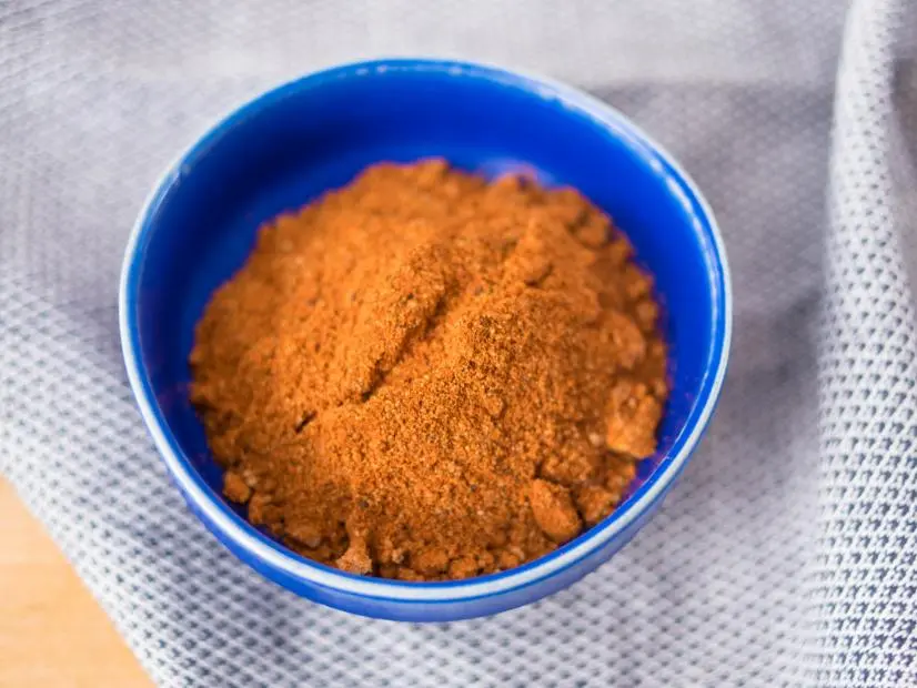 Host Hawa Hassan displays her finished Spice mix for her Braii-Rubbed Ribeyes, as seen on Food Network Kitchen's Hawa at Home