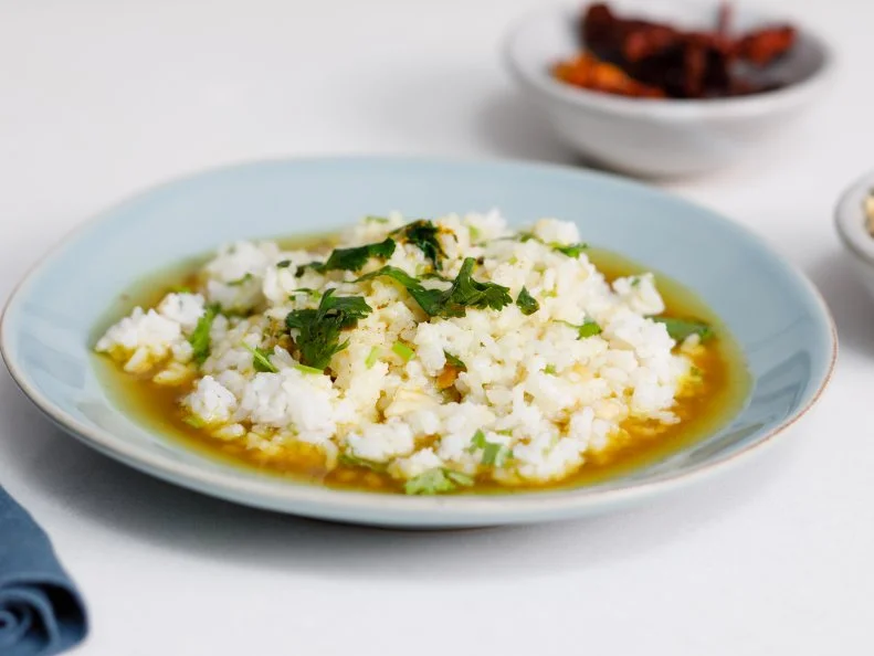 Chef Deepa Shridhar prepares Rasam with Ghee Rice, as seen on Food Network Kitchen.
