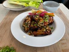 While fried chicken wings are one of my favorites, you can also achieve the same bite without frying them. An air fryer produces wings that taste just as good and have almost no added oil. One of my favorite tricks is to use the marinade as the basting liquid. It helps reduce waste and gives such good flavor. If you don&rsquo;t have an air fryer you can bake the wings in the oven. Follow the same instructions, but check the wings periodically&mdash;you may need to cook them a tad longer.