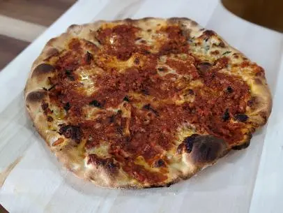 Christian Petroni makes Cheese Pizza, as seen on Pizza Making Like a Pro on Food Network Kitchen.