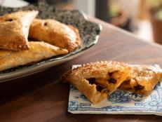Who says pie can&rsquo;t be the perfect picnic dessert? These travel-friendly hand pies are full of comforting flavors but bake in a fraction of the time.