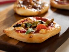These mini antipasto pizzas are easy to make and totally customizable! Start with your favorite toppings and create the most delicious pizza you can come up with; the varieties are endless!