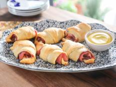 Still have leftover cranberry sauce from Thanksgiving? Use it in these sweet-and-savory crescent rolls! They&rsquo;re delicious, super-easy to make and come together in just about 30 minutes.